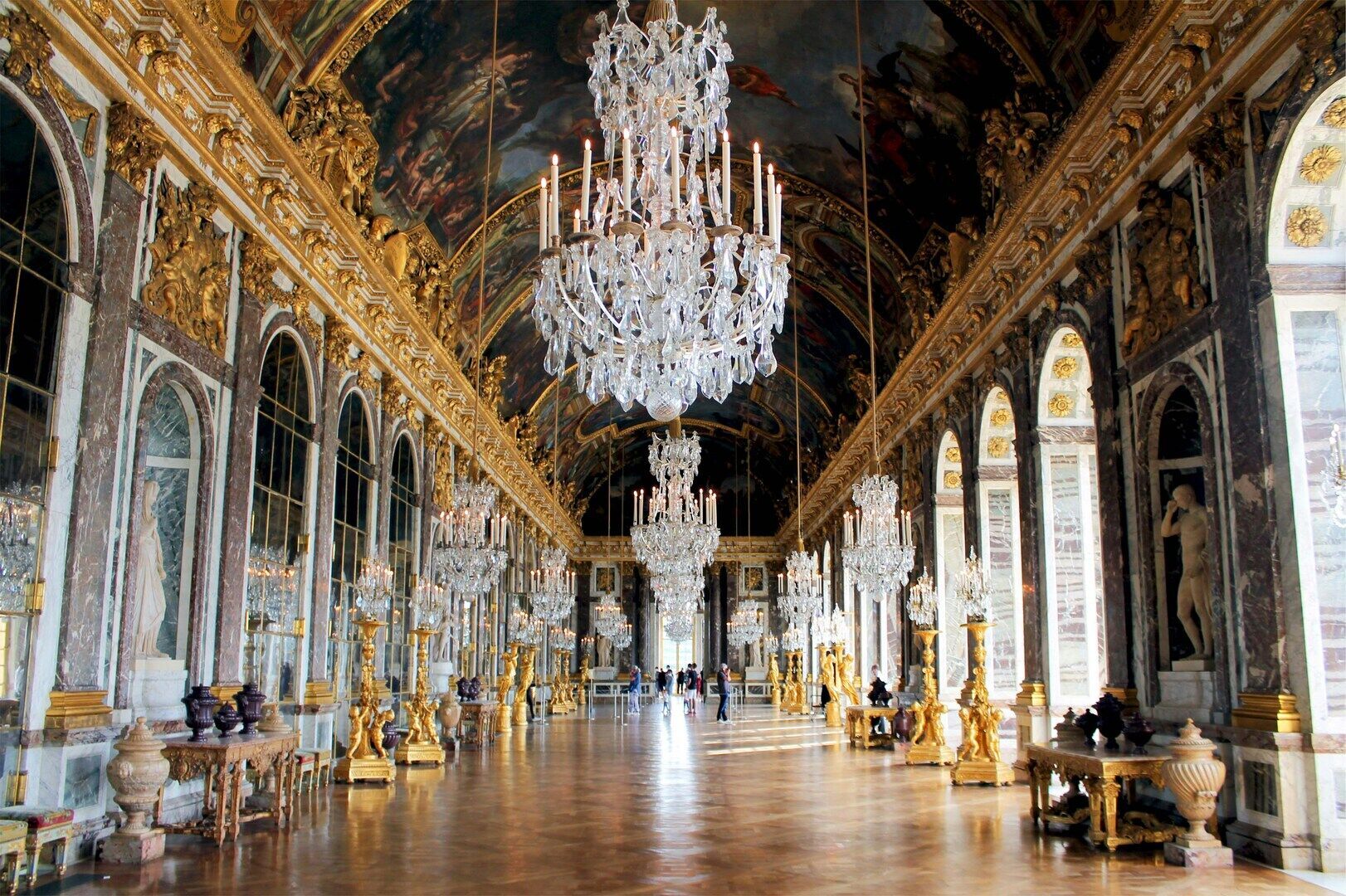 The Hall of Mirrors with its 357 mirrors and crystal chandeliers
