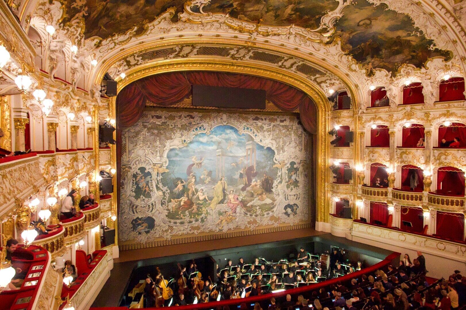 Interior of Prague's National Theatre with gilded balconies
