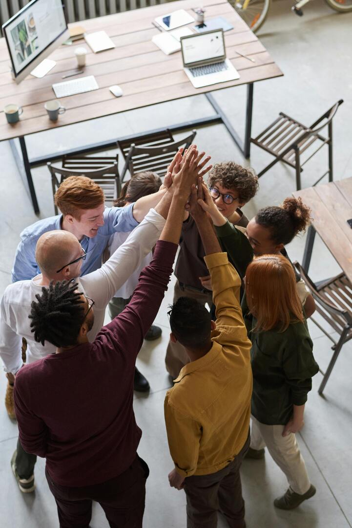 People high-fiving